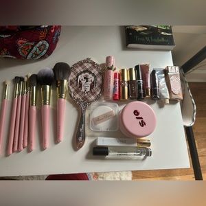 Brush, tools, and lip bundle.